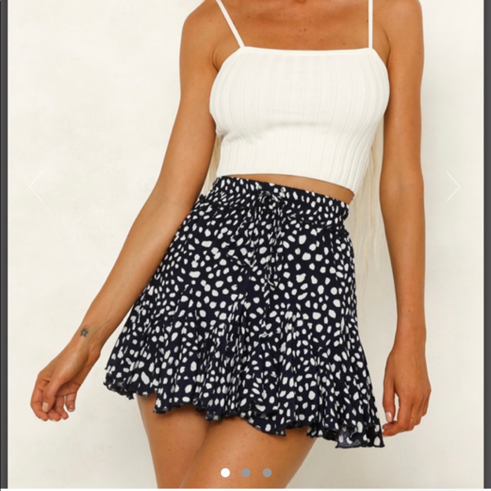 navy mini skirt with polka dots